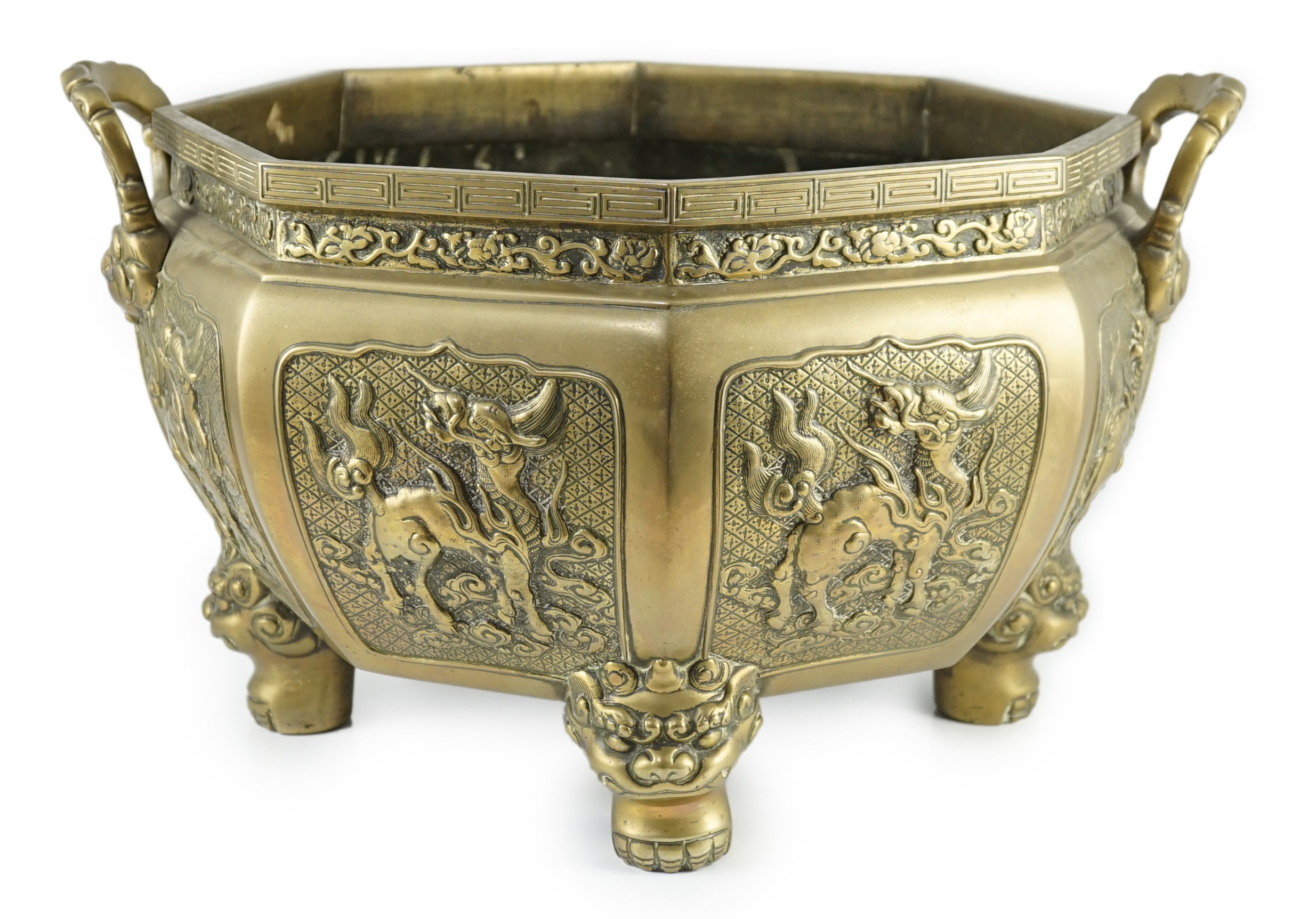 A large Chinese polished bronze octagonal jardiniere, 19th century, 48cm wide at handles, slight faults